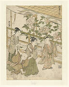 Vier jongens spelend bij een perkje met pioenrozen