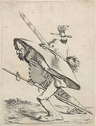 Man met enorme hoed op zijn rug